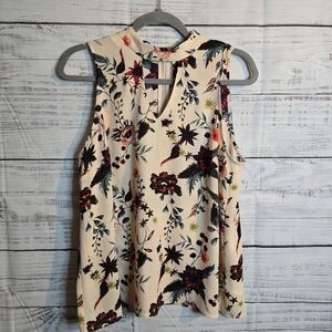 Carolina Belle beige and floral casual sleeveless blouse. Womans size Large.
